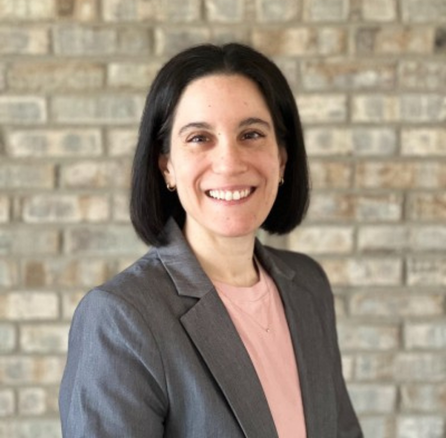 Woman smiling for the camera for a headshot - Applied CAx Siemens software
