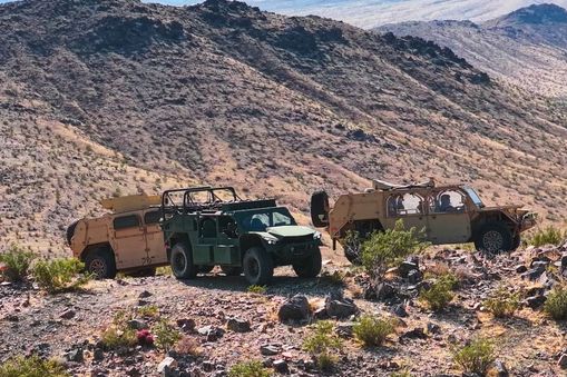 Three defense vehicles in the desert Applied CAx Siemens defense software