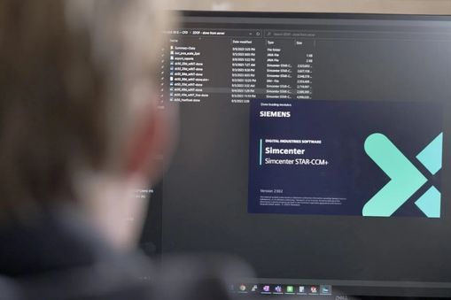 Person looking at computer with Simcenter STAR-CCM+ open — Applied CAx Siemens software
