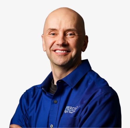 Man smiling at the camera for a headshot Model airplane — Applied CAx Siemens software
